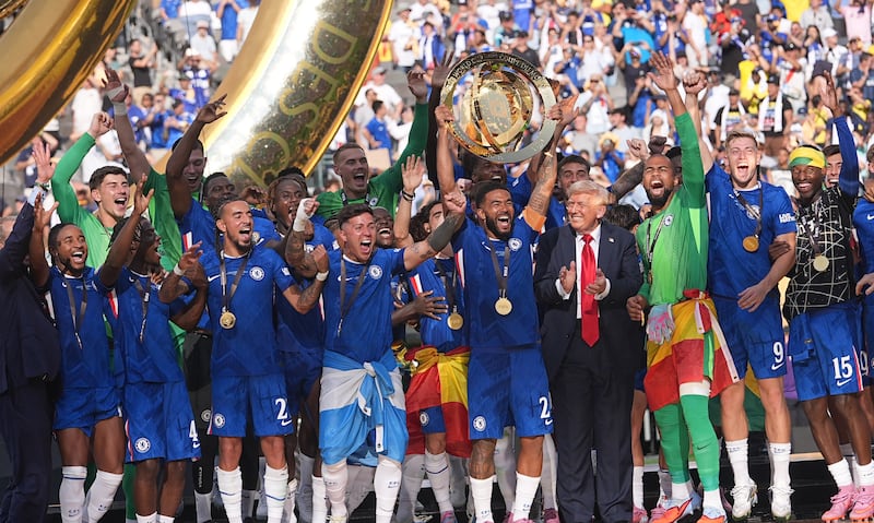 Eventually the players were forced to celebrate with President Trump standing among them as if he too were a member of the team.