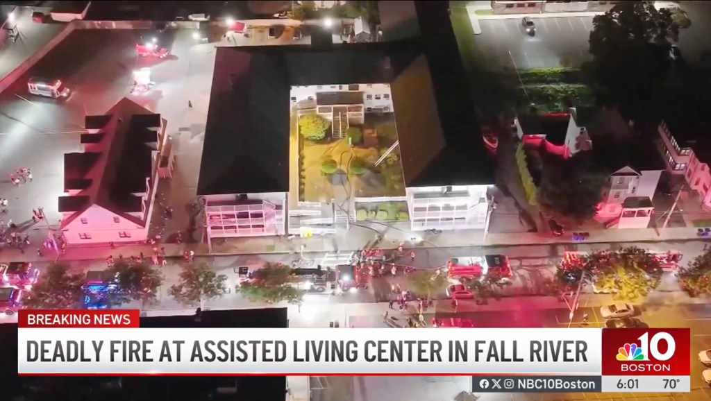 Aerial view of firefighters responding to a deadly fire at an assisted living facility in Fall River.
