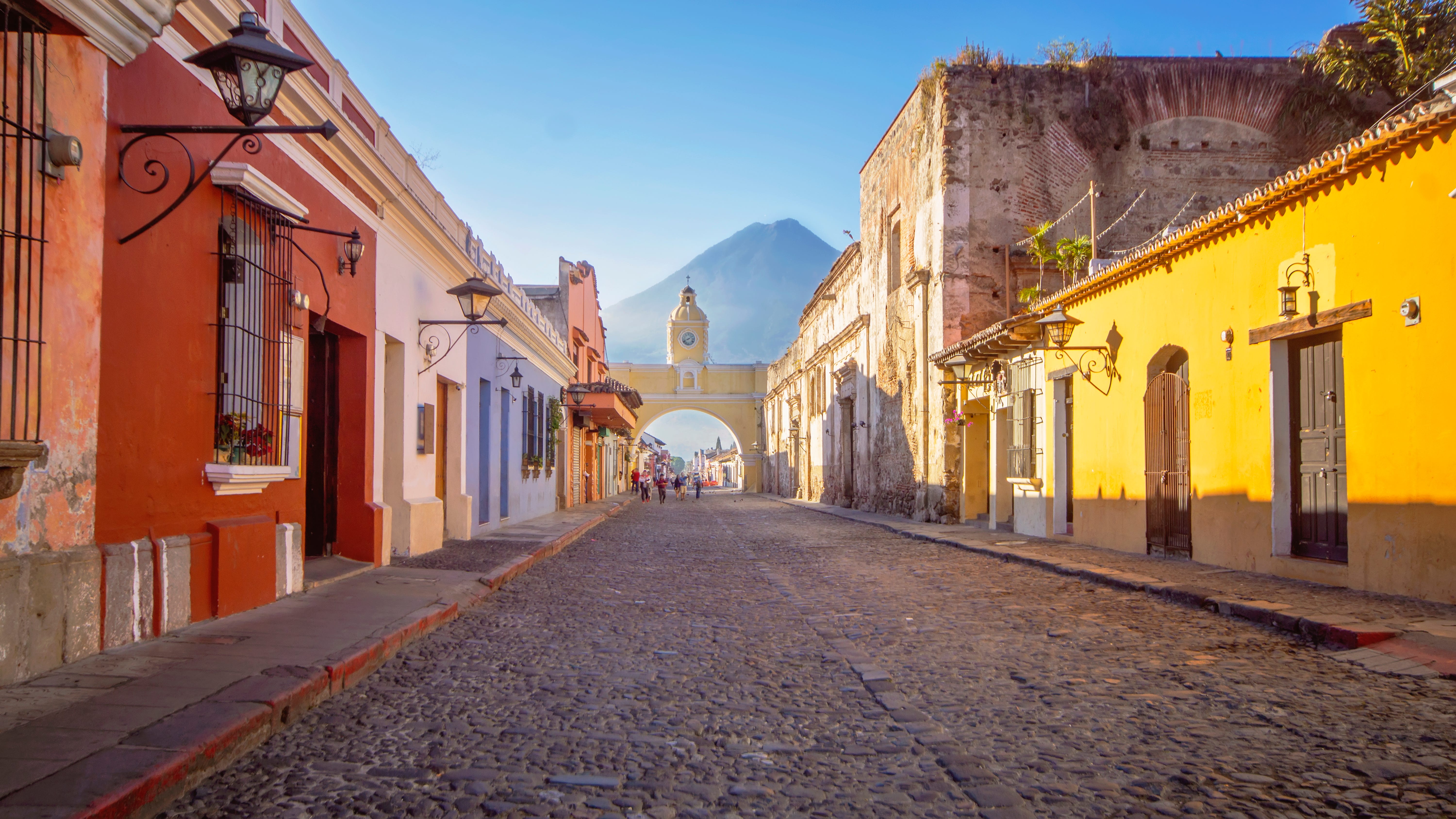 Pastel buildings lining cobblestone streets in Antigua Guatemala,