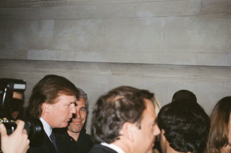 Donald Trump and Jeffrey Epstein attend a Victoria's Secret Angels event sponsored by Rogers & Cowan at the club Duvet on 21st Street in New York City, New York on April 9, 1997.