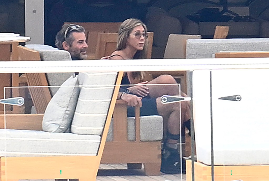 Jennifer Aniston and Jim Curtis in Spain Saturday