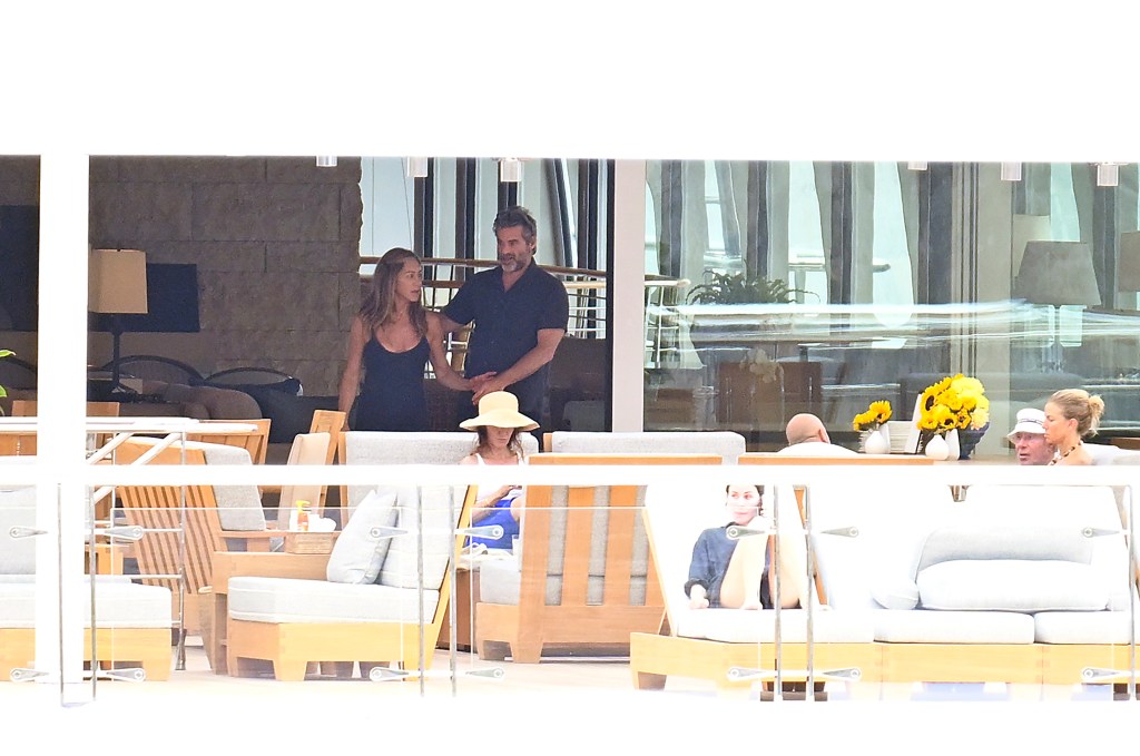 Jennifer Aniston and Jim Curtis in Spain Saturday