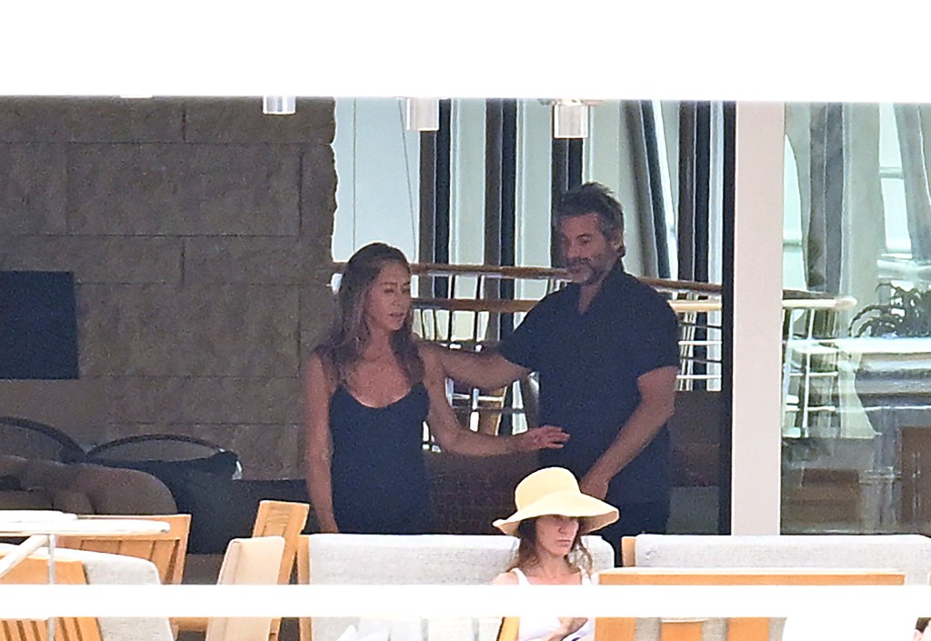 Jennifer Aniston and Jim Curtis in Spain Saturday