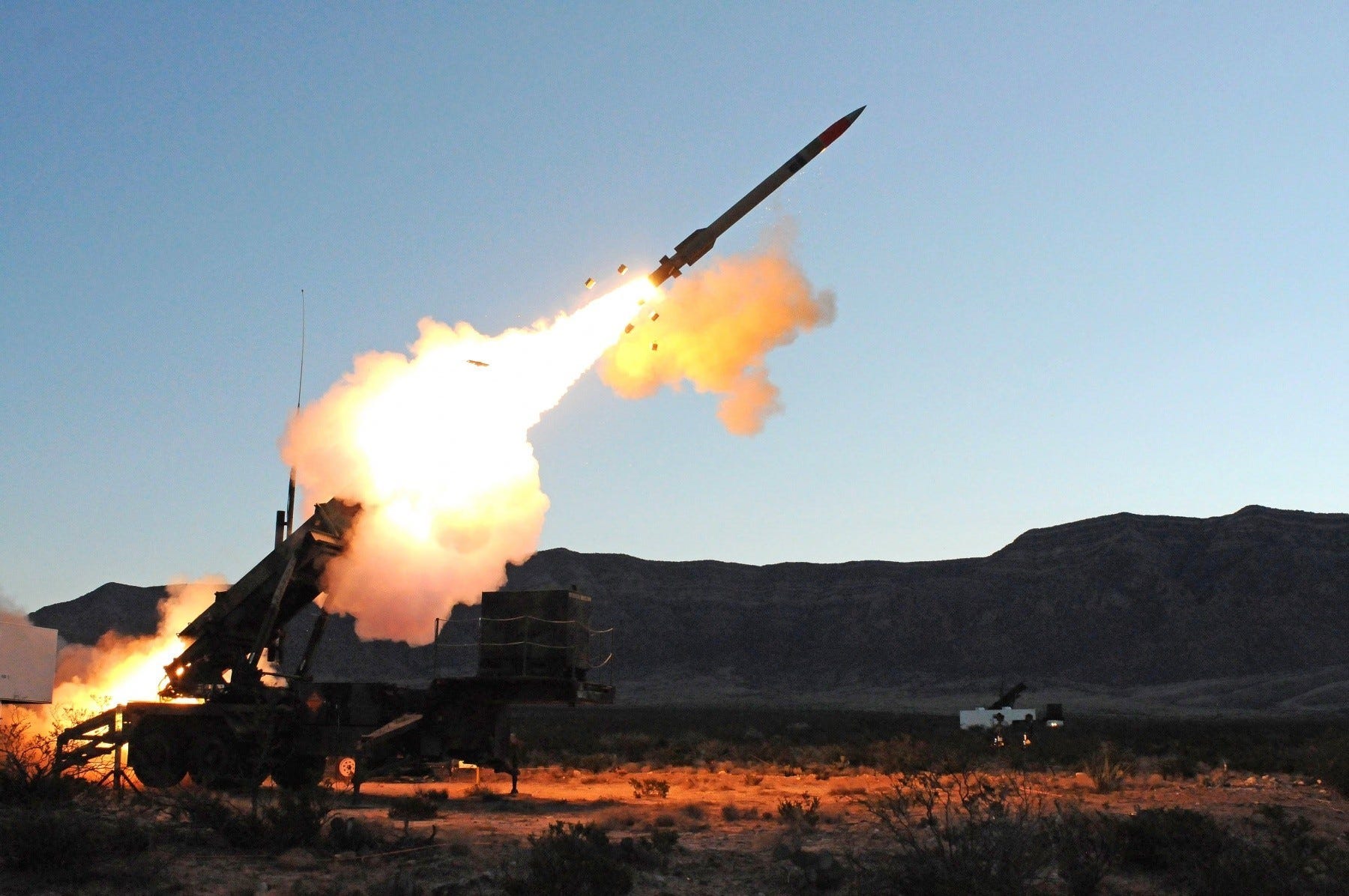 A shot of a Patriot missile battery firing an interceptor in a US Army test. The Patriot missile defense system is a ground-based interceptor able to eliminate airborne threats.