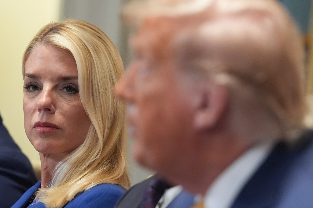Attorney General Pam Bondi and President Donald Trump at a cabinet meeting.