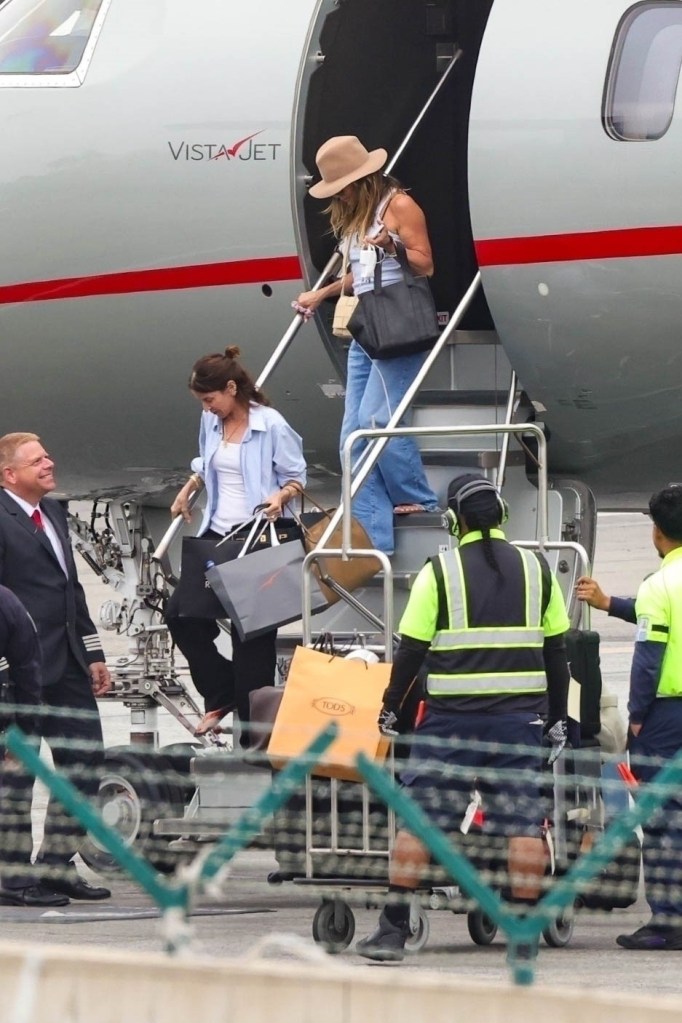 Jennifer Aniston returns from a romantic Spain trip without her new beau, Jim Curtis