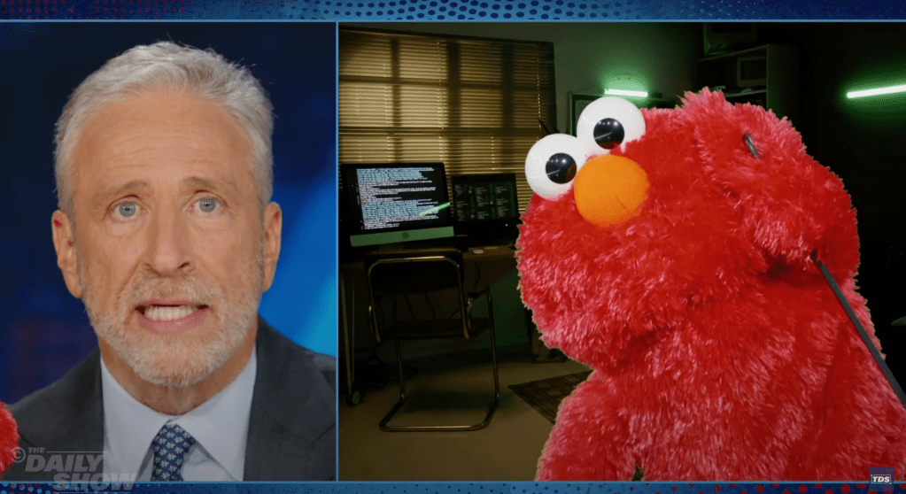 Jon Stewart’s ‘Sesame Street’ Spoof Addresses Elmo’s Tweets, With Muppet Saying He’s “Alt-Right” So There’s “No Reason” To Pull PBS Funding