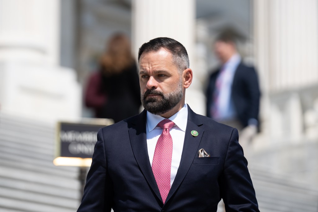 WASHINGTON - MAY 18: Rep. Cory Mills, R-Fla., walks down the House steps of the Capitol on Thursday, May 18, 2023