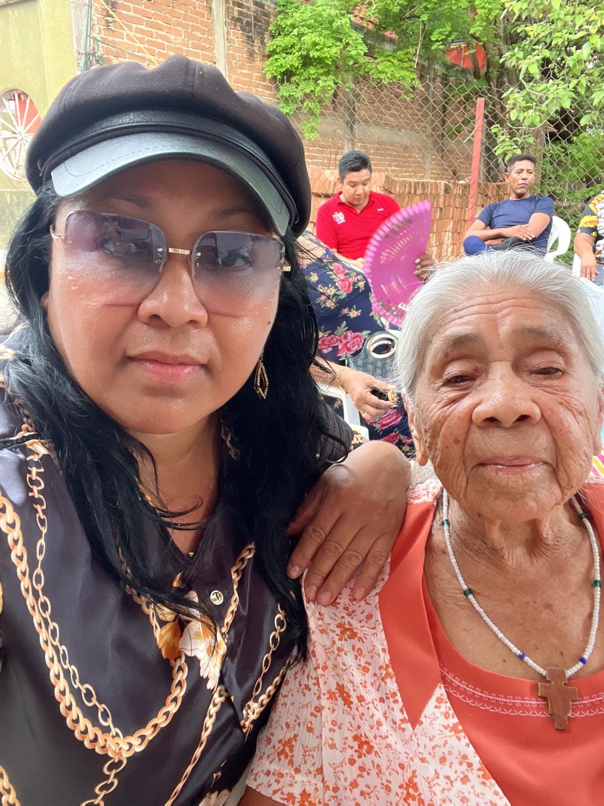 Two people take a selfie.