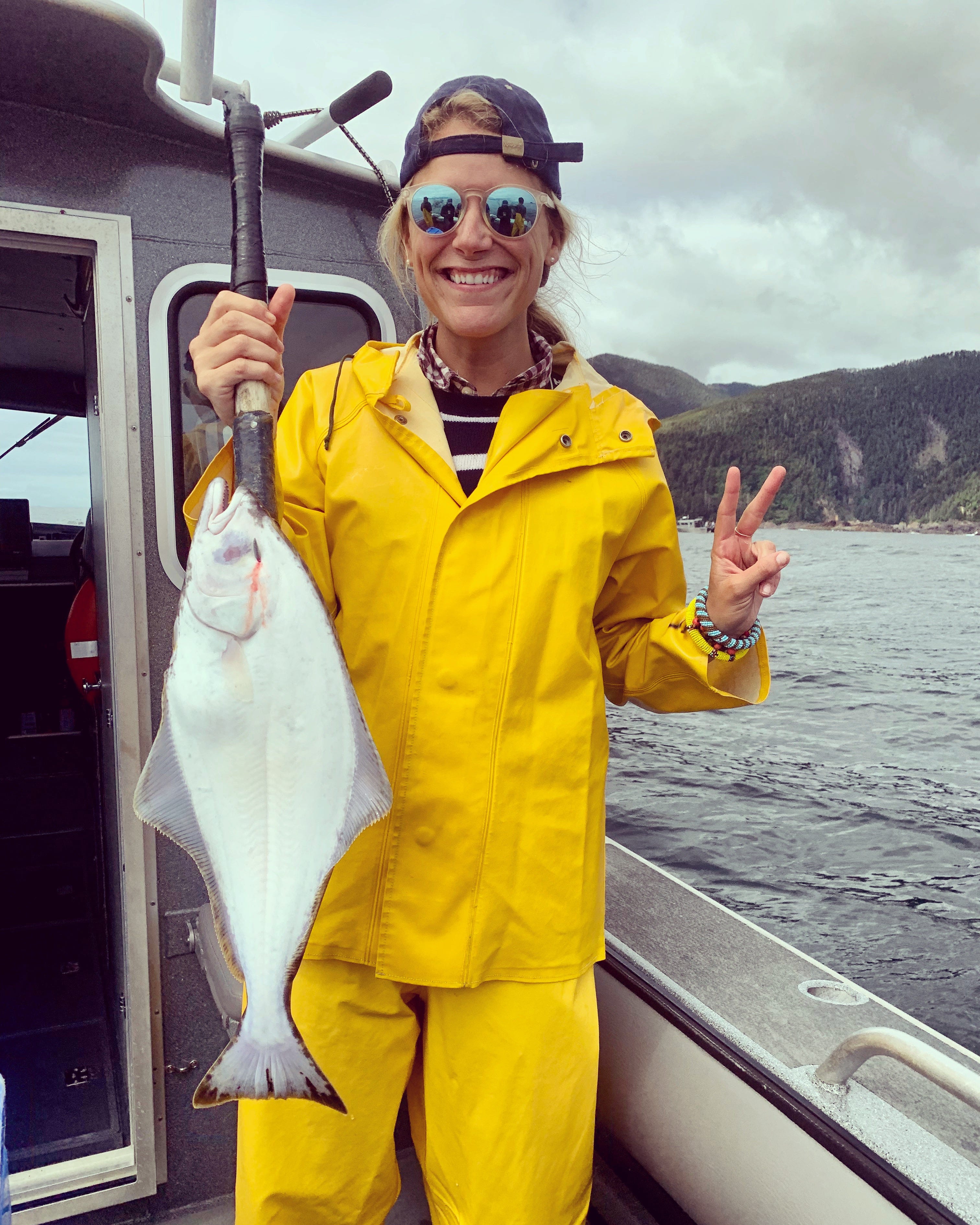 Katherine Parker-Magyar holding fish in alaska