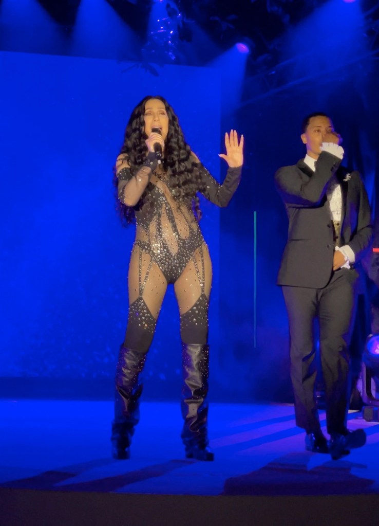 Cher performing at a Dolce & Gabbana event