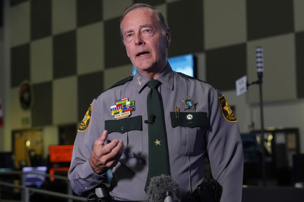 Sheriff Kevin Rambosk speaking at a press conference.