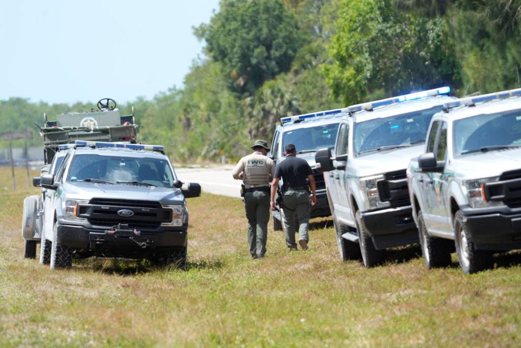 Law enforcement officers at a crime scene.