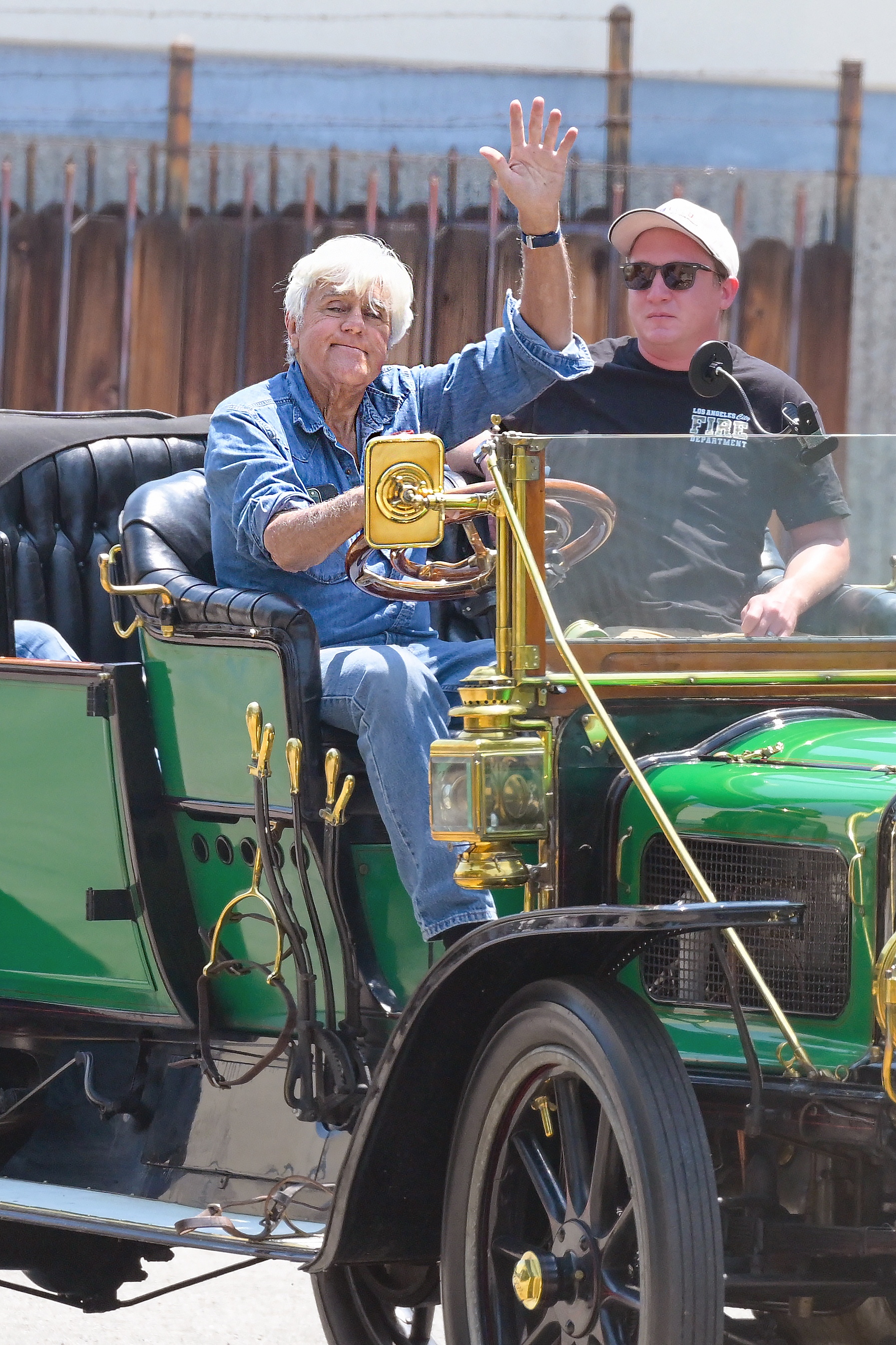 Jay Leno takes a ride on his vintage 1910 Model O-O White Steam Car in Los Angeles.