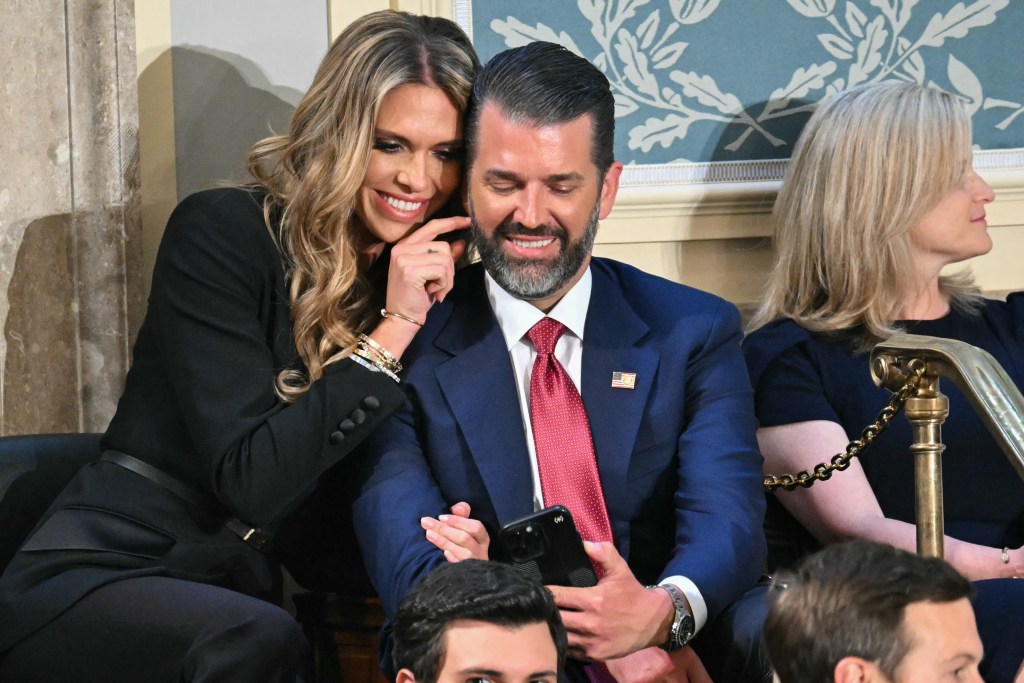 Donald Trump Jr. (R) sits with Bettina Anderson ahead of US President Donald Trump's address to a joint session of Congress in the House Chamber of the US Capitol in Washington, DC, on March 4, 2025. 
