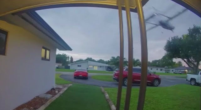 Home security footage of a small plane crash.