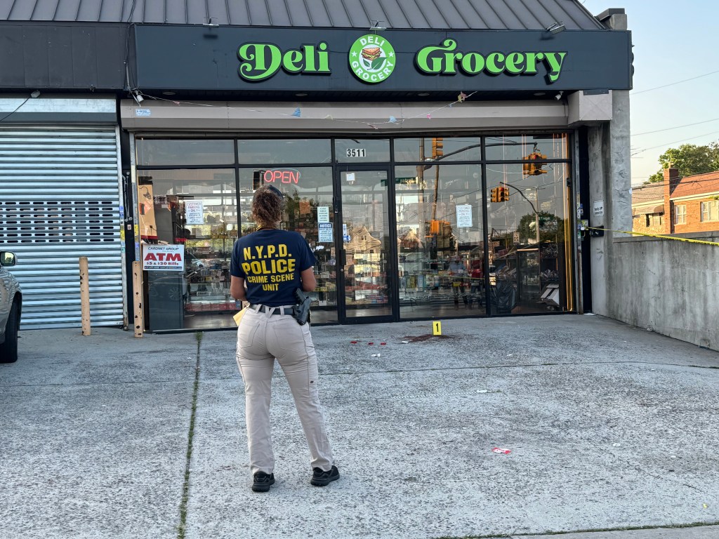 NYPD crime scene unit at a deli after a homicide.