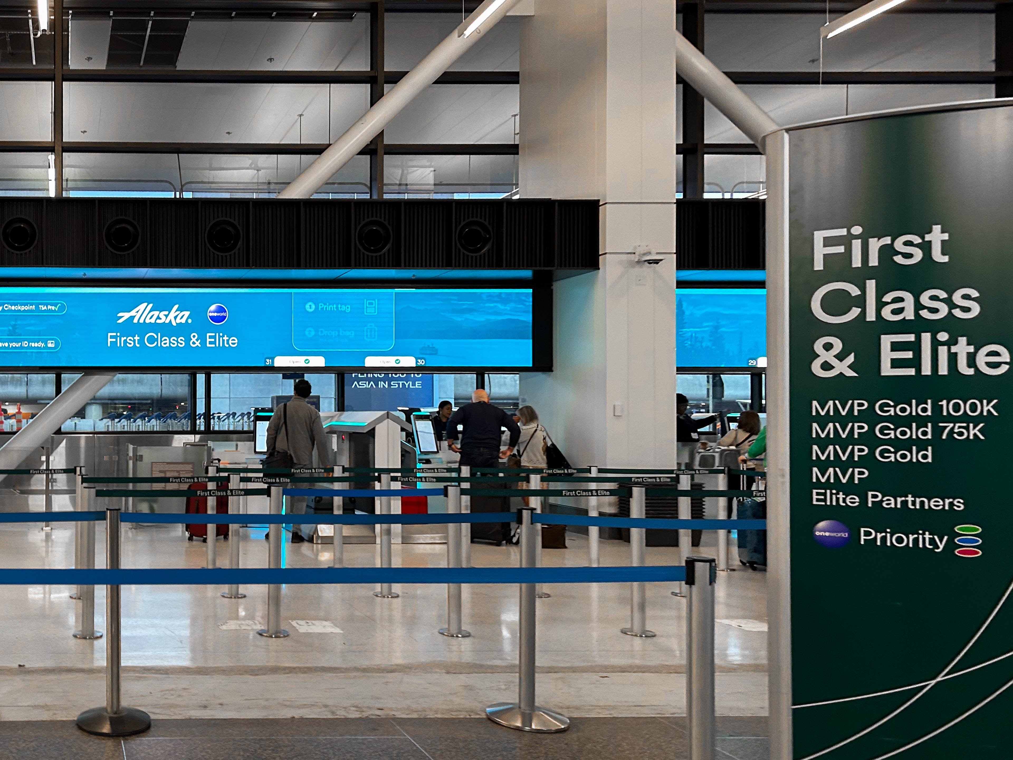 An Alaska first-class check-in counter at an airport