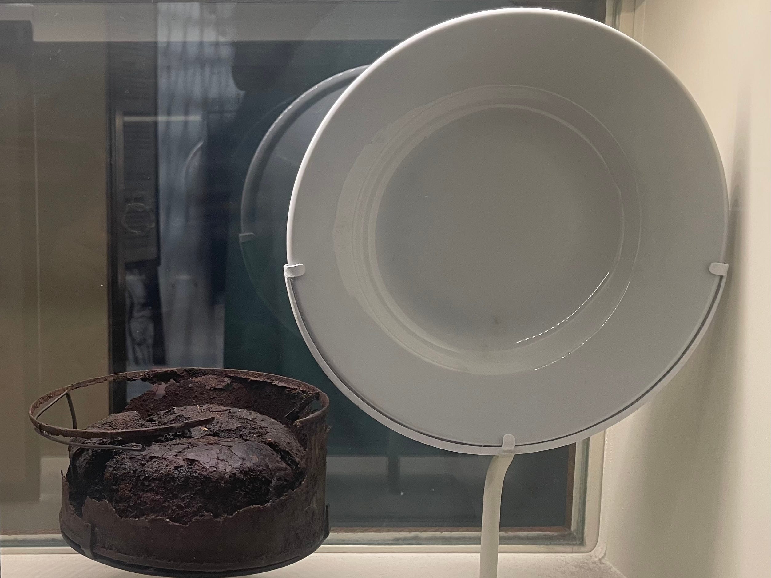 A stale bread in a tin from xx and a bowl found in the U-505.