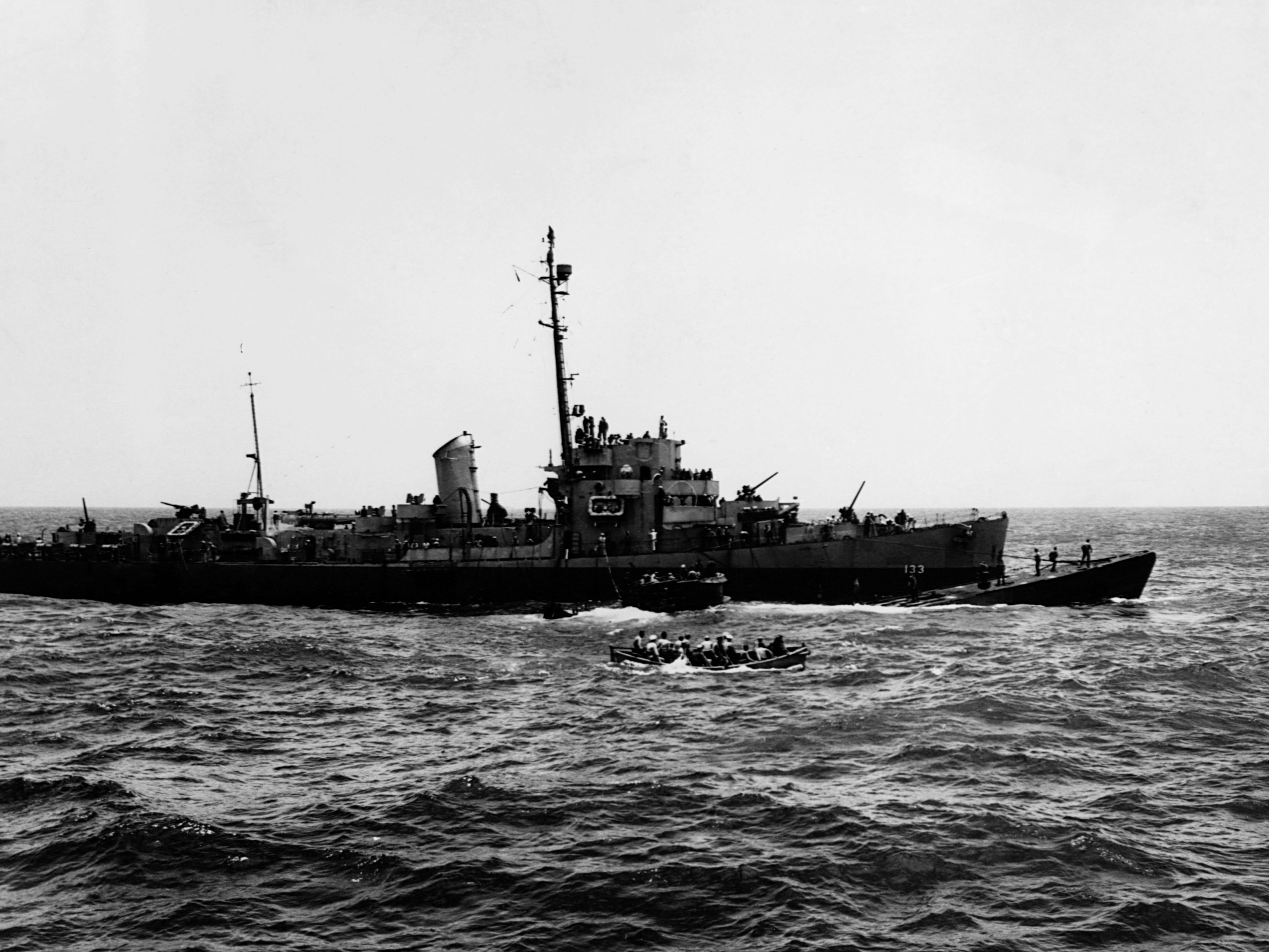 The captured German submarine U-505 alongside the USS Pillsbury after its capture in 1944.