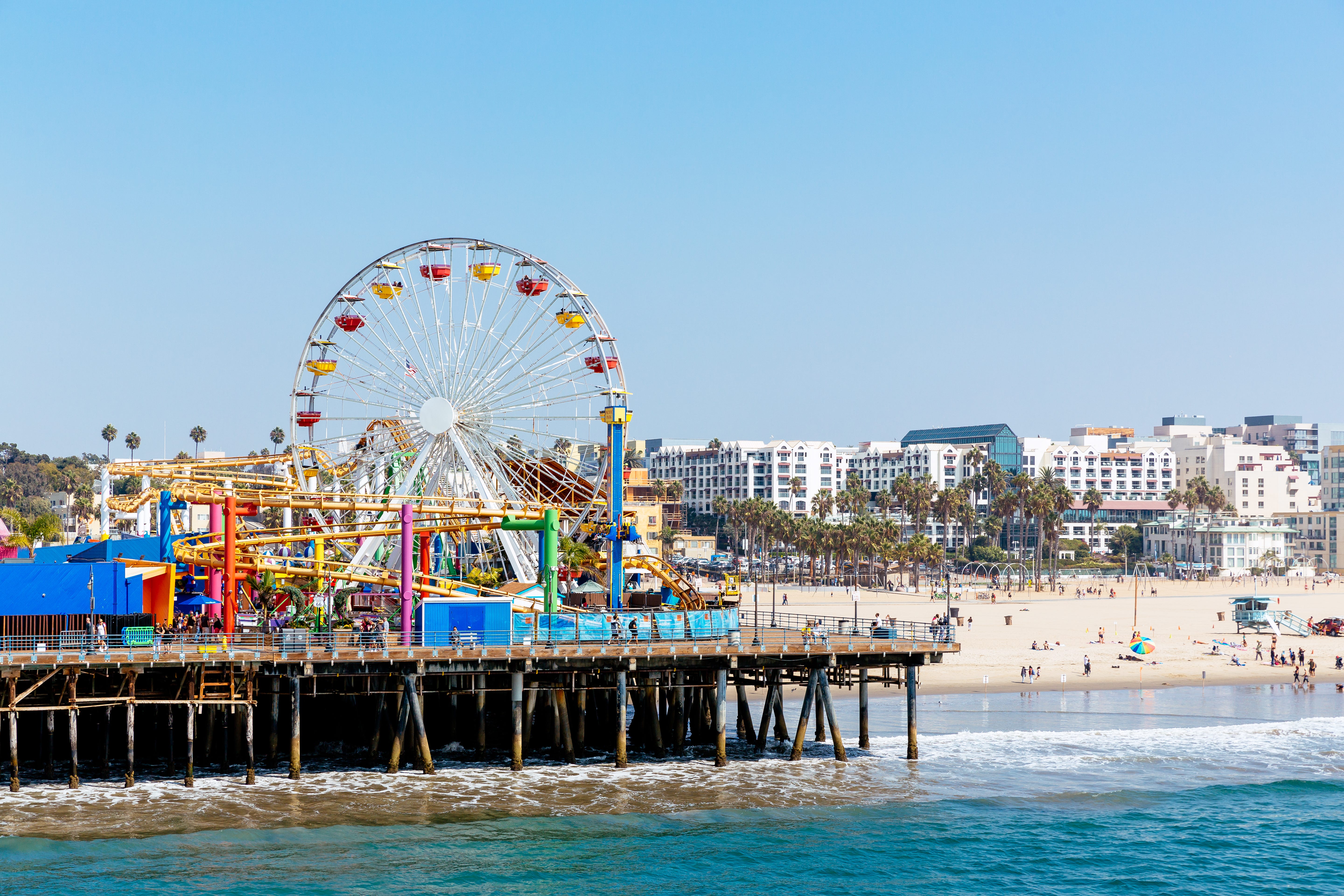 The Los Angeles skyline with Santa Monica Pier in the background.