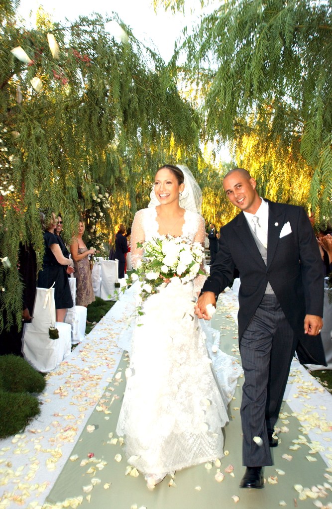  Jennifer Lopez and Cris Judd pose together in 2001.