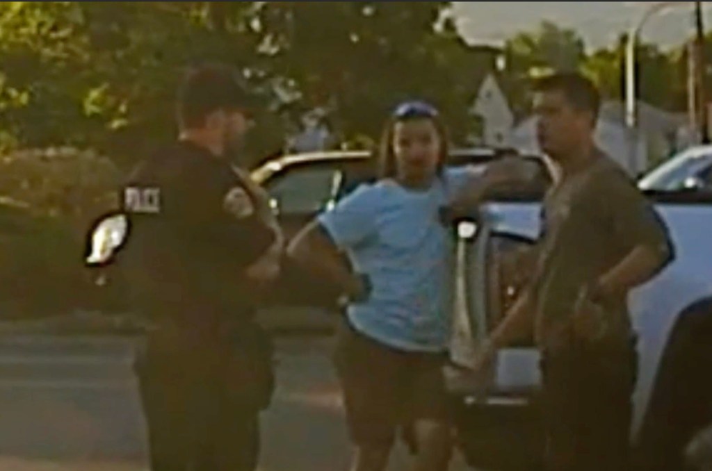 Video still image of Travis Decker interacting with police.