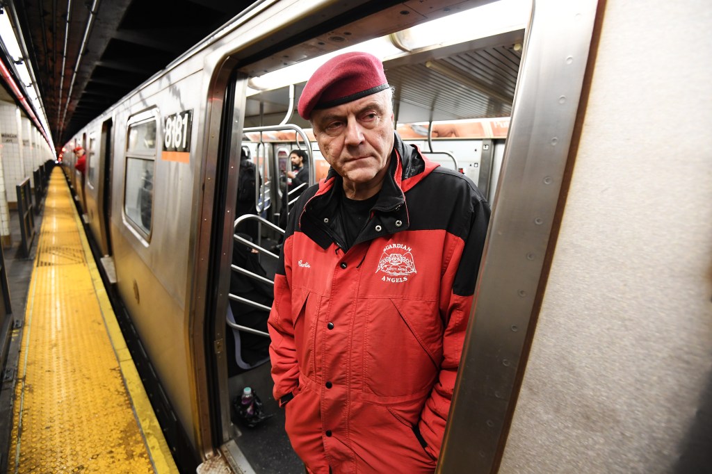 Curtis Sliwa of the Guardian Angels on a New York City subway car.