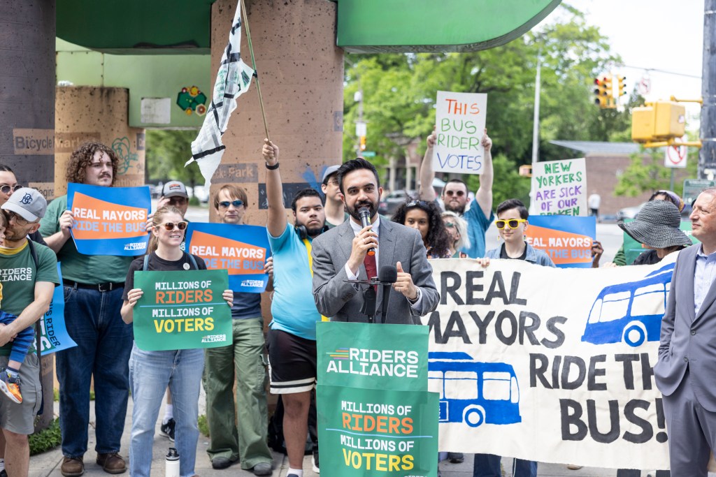 Mayoral candidates Zohran Mamdani and Brad Lander at a Riders Alliance rally.