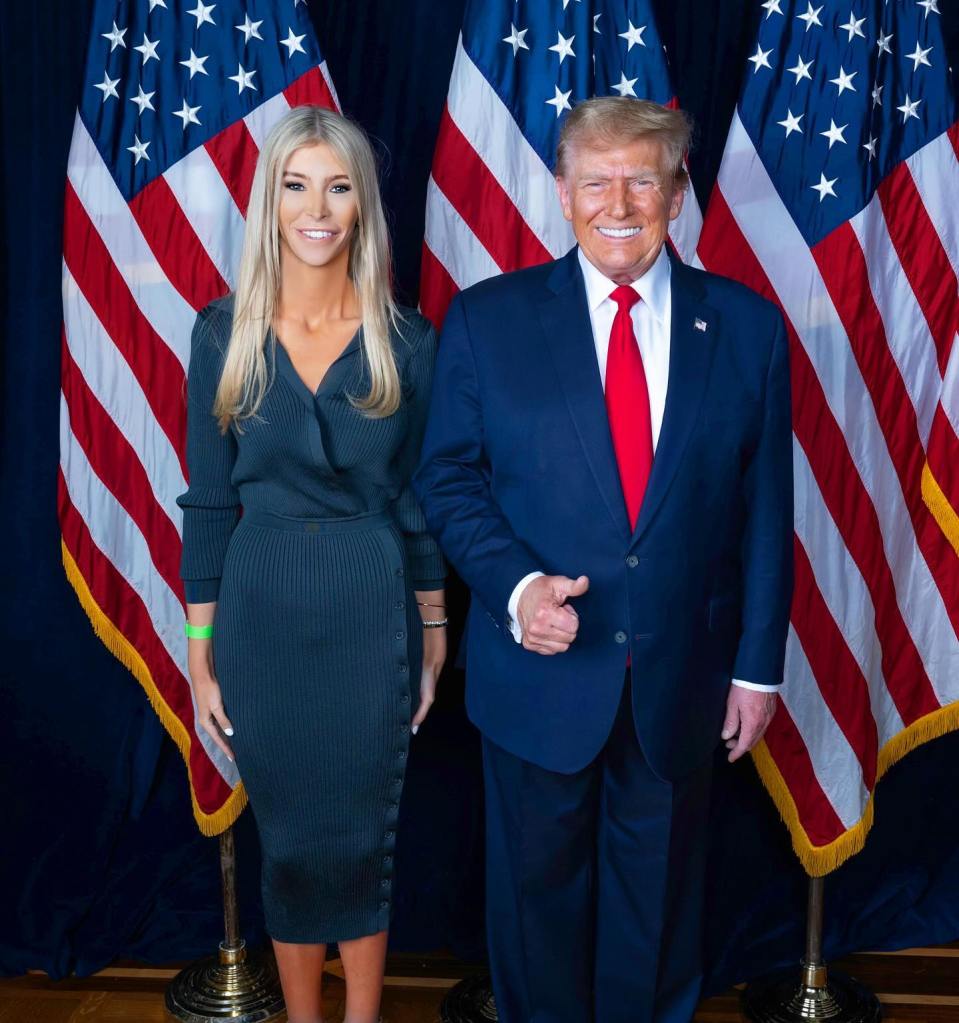 Sophia Hutchins and Donald Trump posing together.