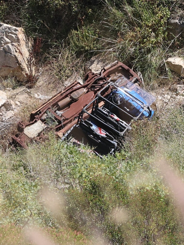 Wreckage of an ATV at an accident site.
