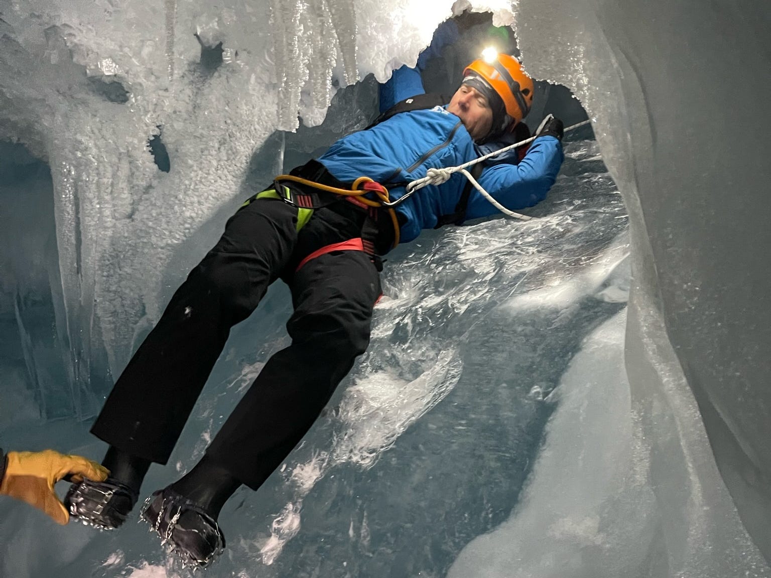 a man ice caving