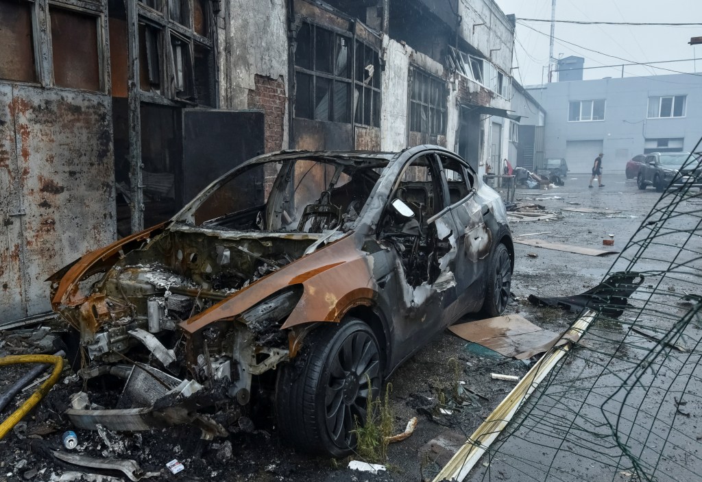 Burned-out car in Dnipro after a Russian drone strike.