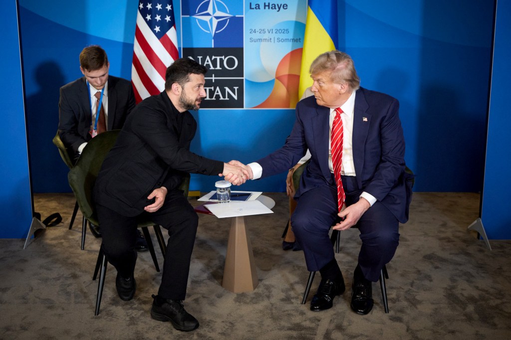Volodymyr Zelensky and Donald Trump shaking hands at the NATO summit.