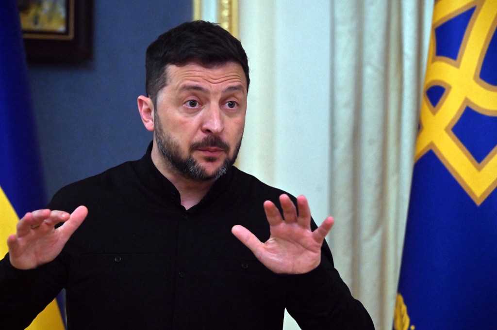Volodymyr Zelensky speaking to the media.