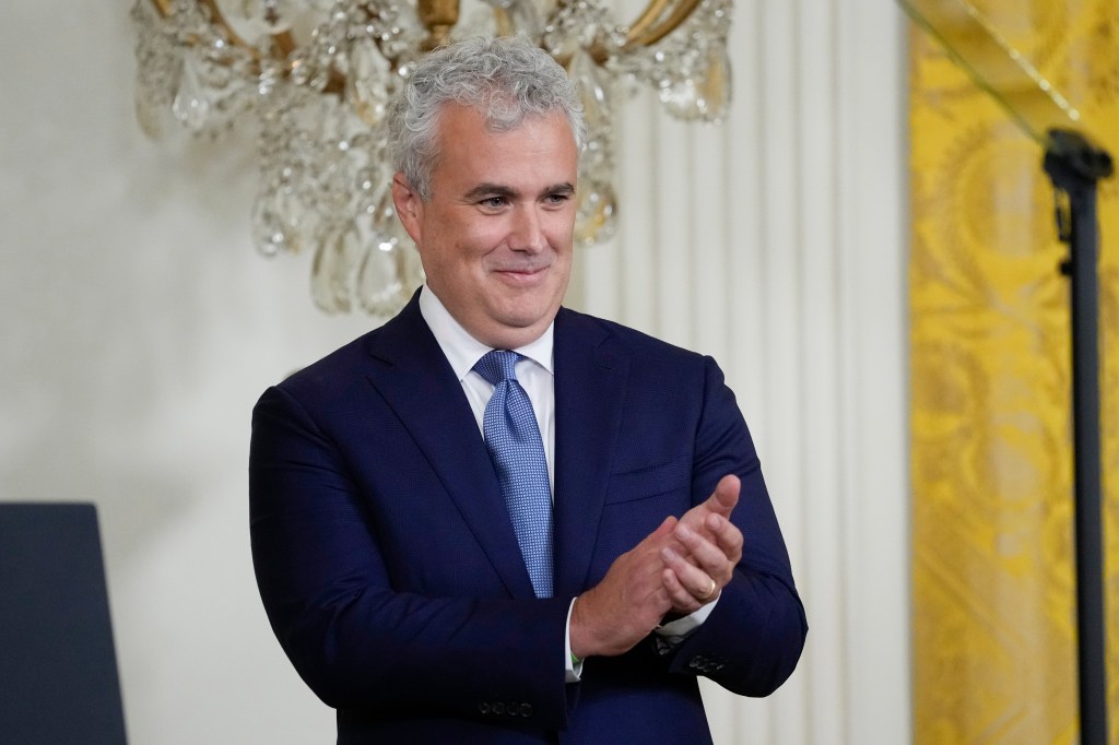 Jeff Zients, White House chief of staff, clapping.