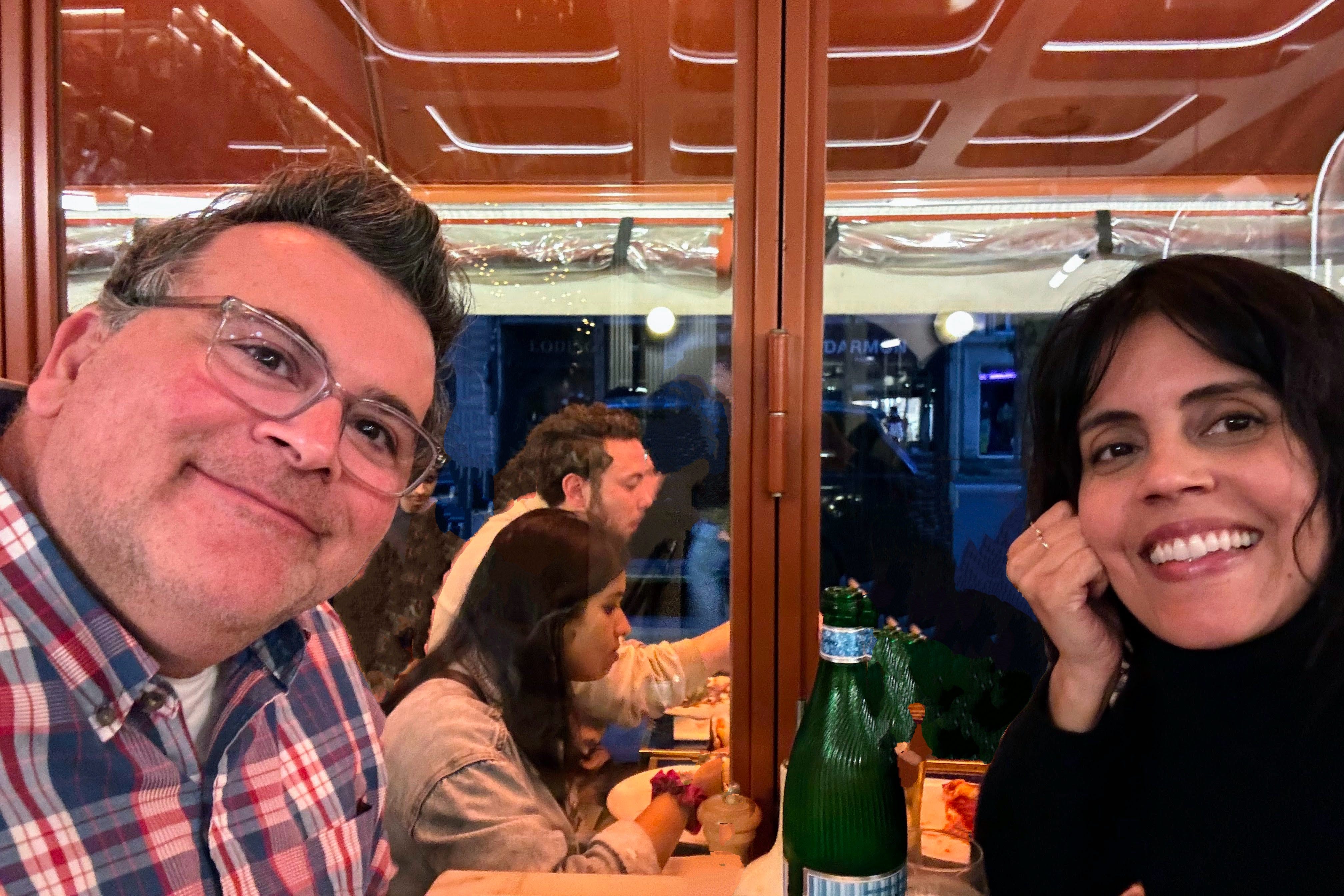 Mar Yvette and husband smiling at restaurant