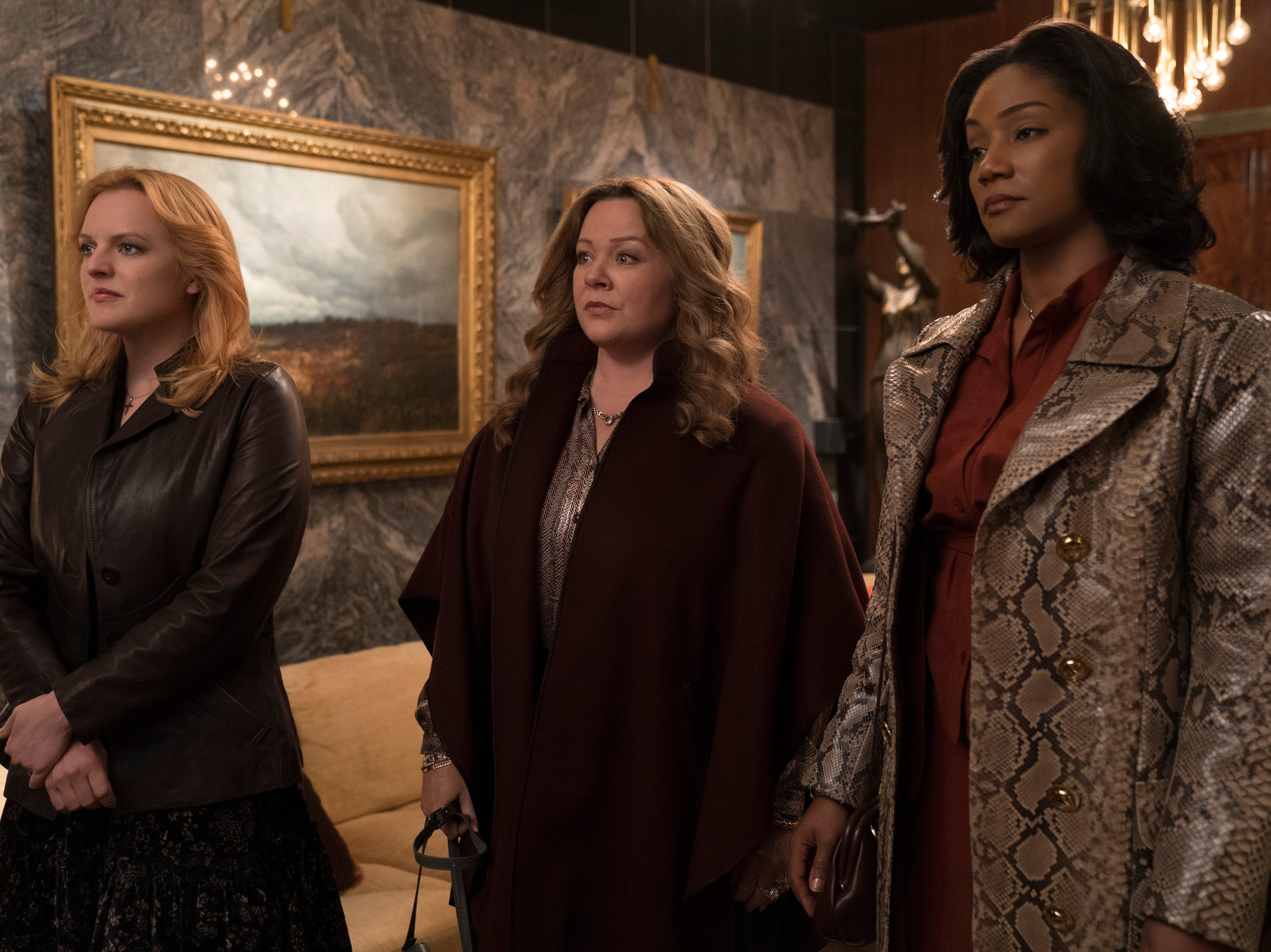 elisabeth moss, melissa mccarthy, and tiffany haddish in the kitchen