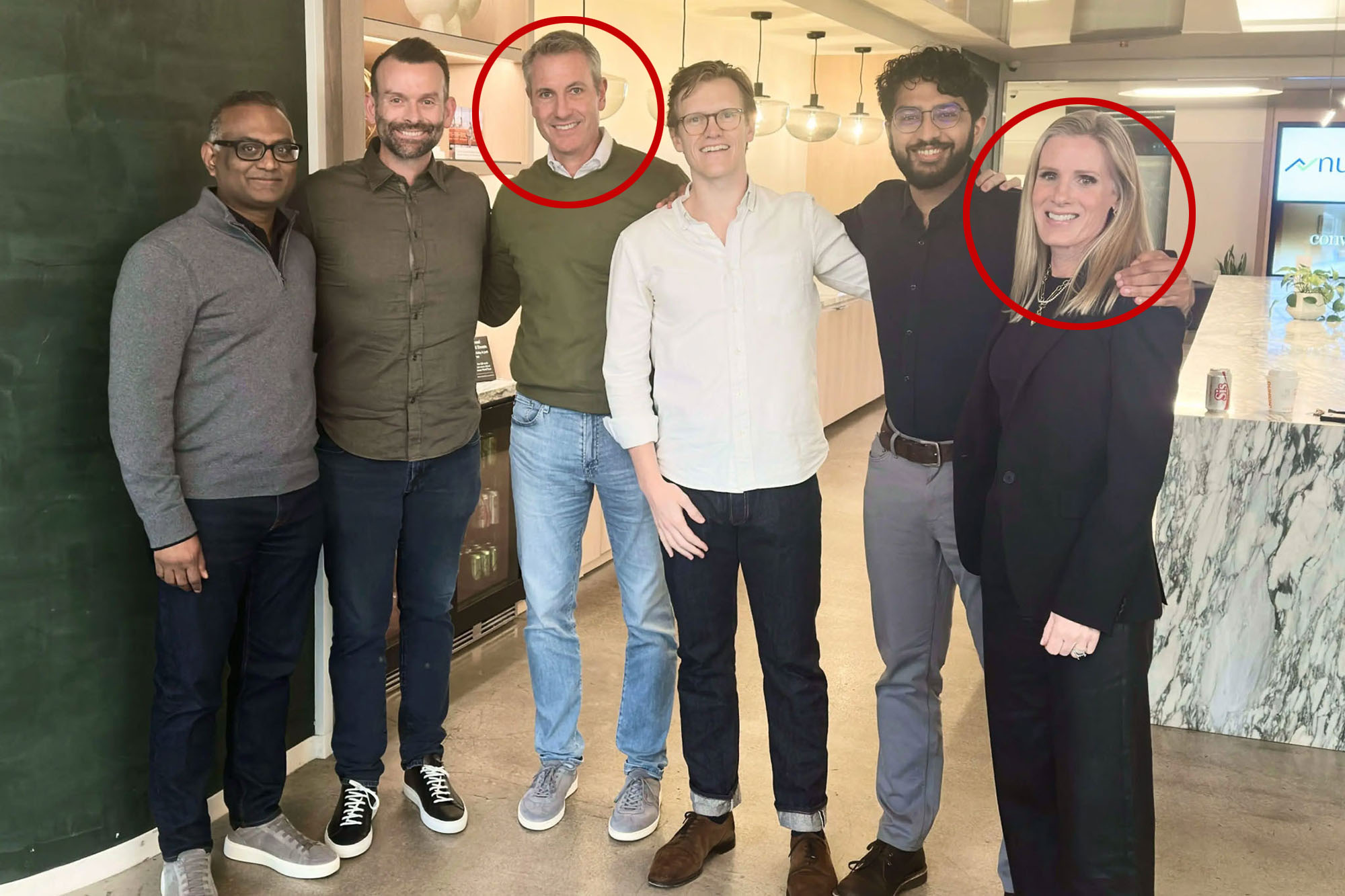 Andy Byron with employees, including Kristin Cabot.