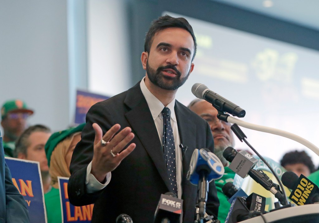 Zohran Mamdani speaking at a press conference.