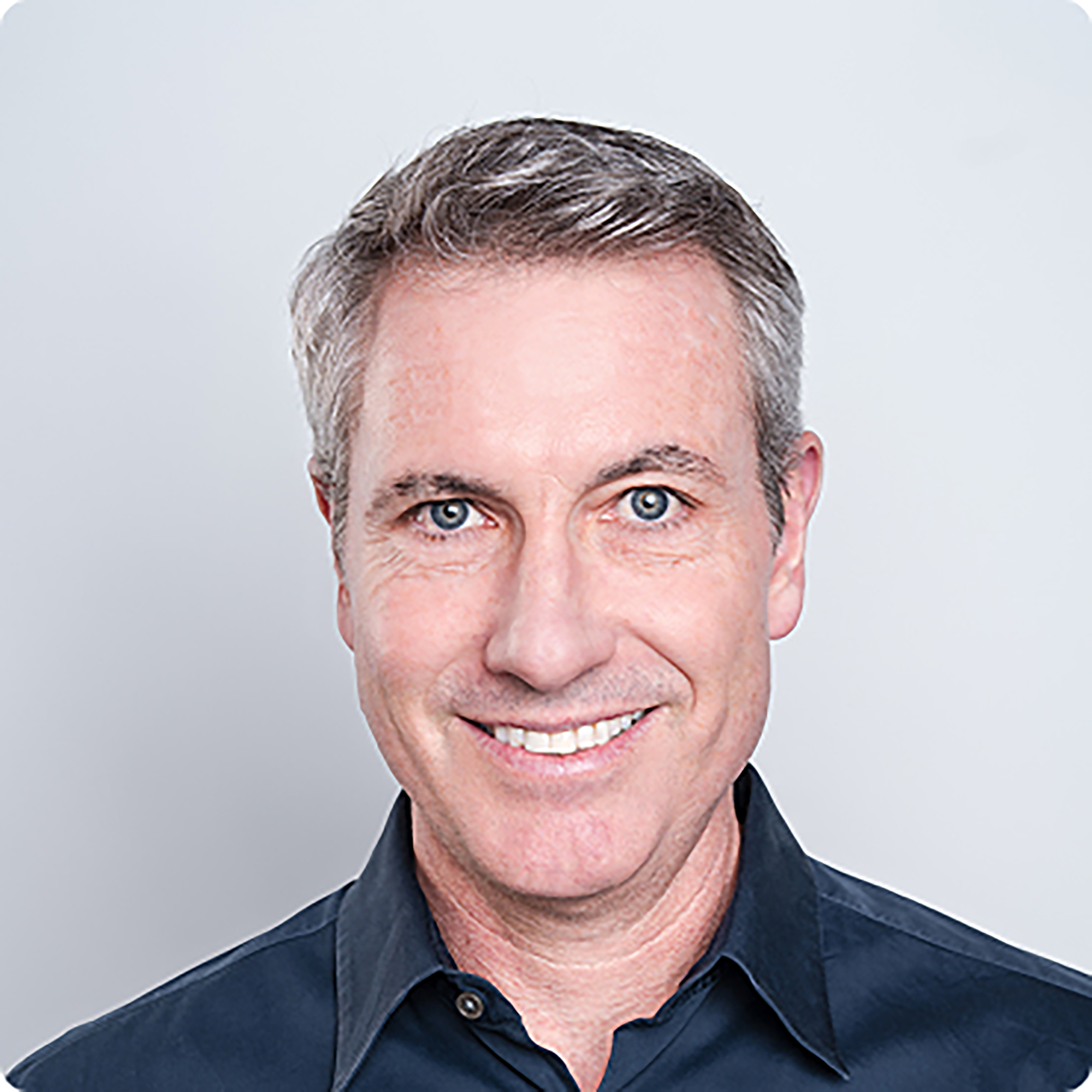 A professional photo of Andy Byron. 