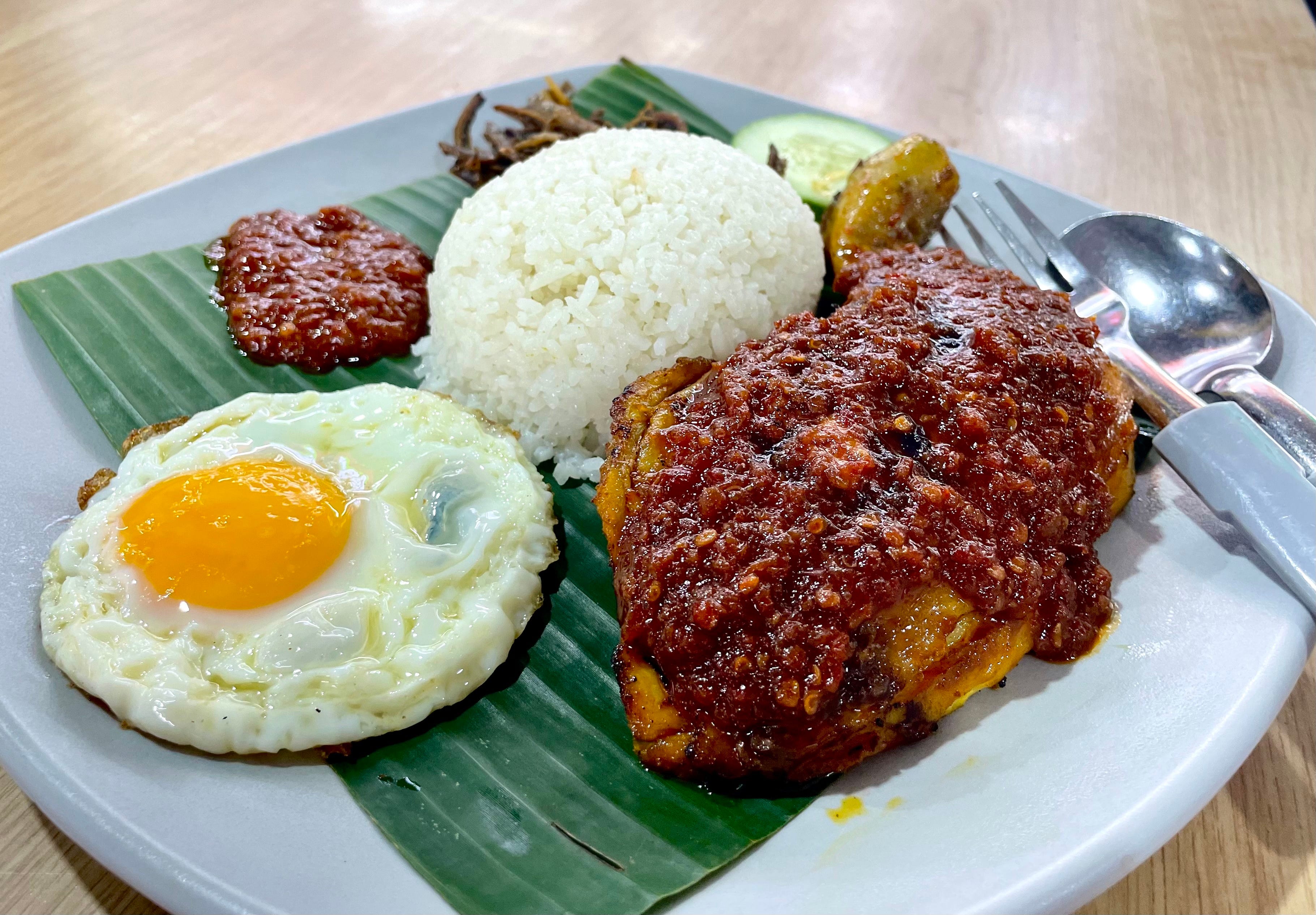 Noorman's signature dish is called Nasi Lemak Ayam Taliwang, a spicy grilled chicken and rice meal.
