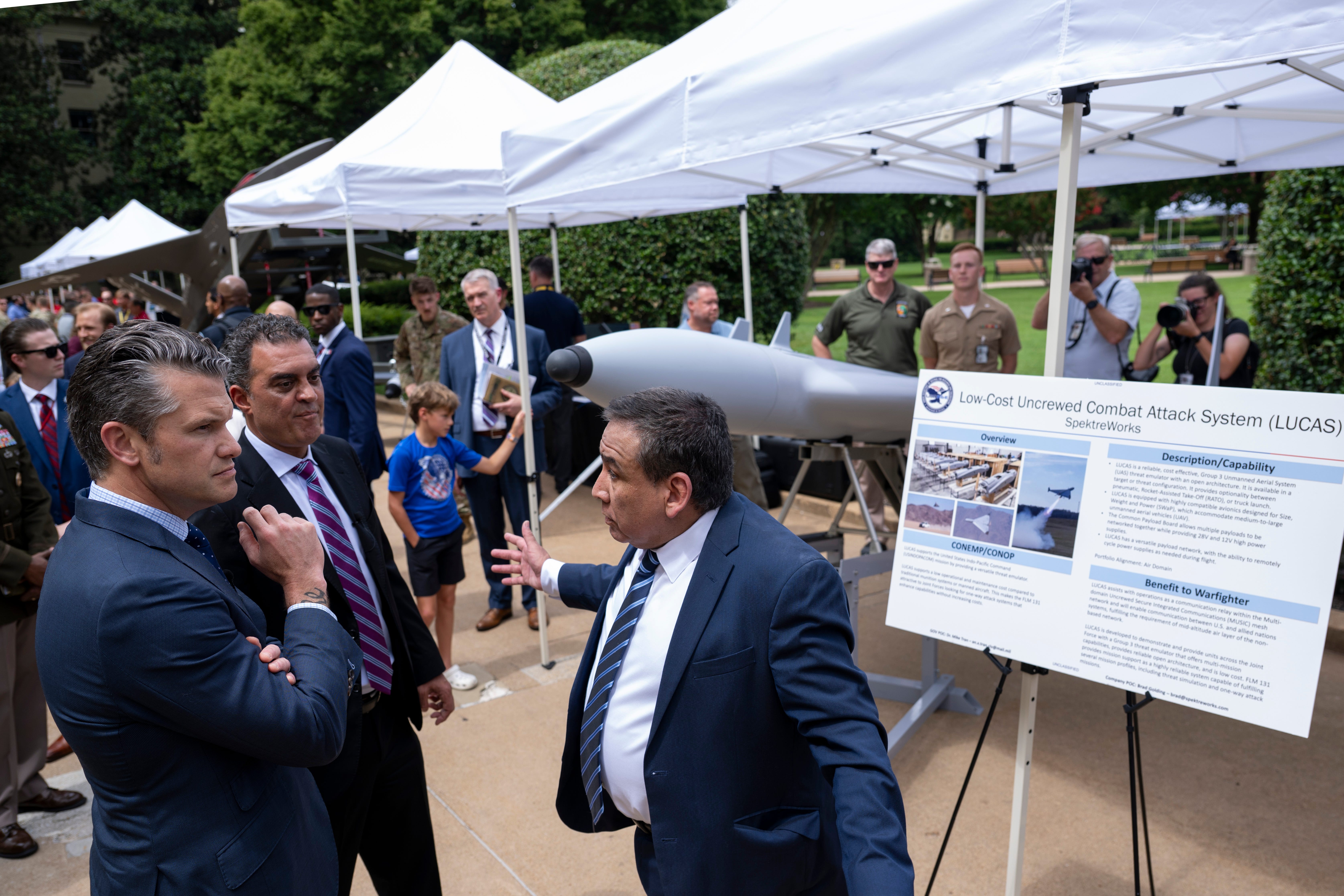 Secretary of Defense Pete Hegseth and Under Secretary of Defense for Research and Engineering Emil Michael tour multi-domain autonomous displays in the courtyard of the Pentagon, Washington, D.C., July 16, 2025.