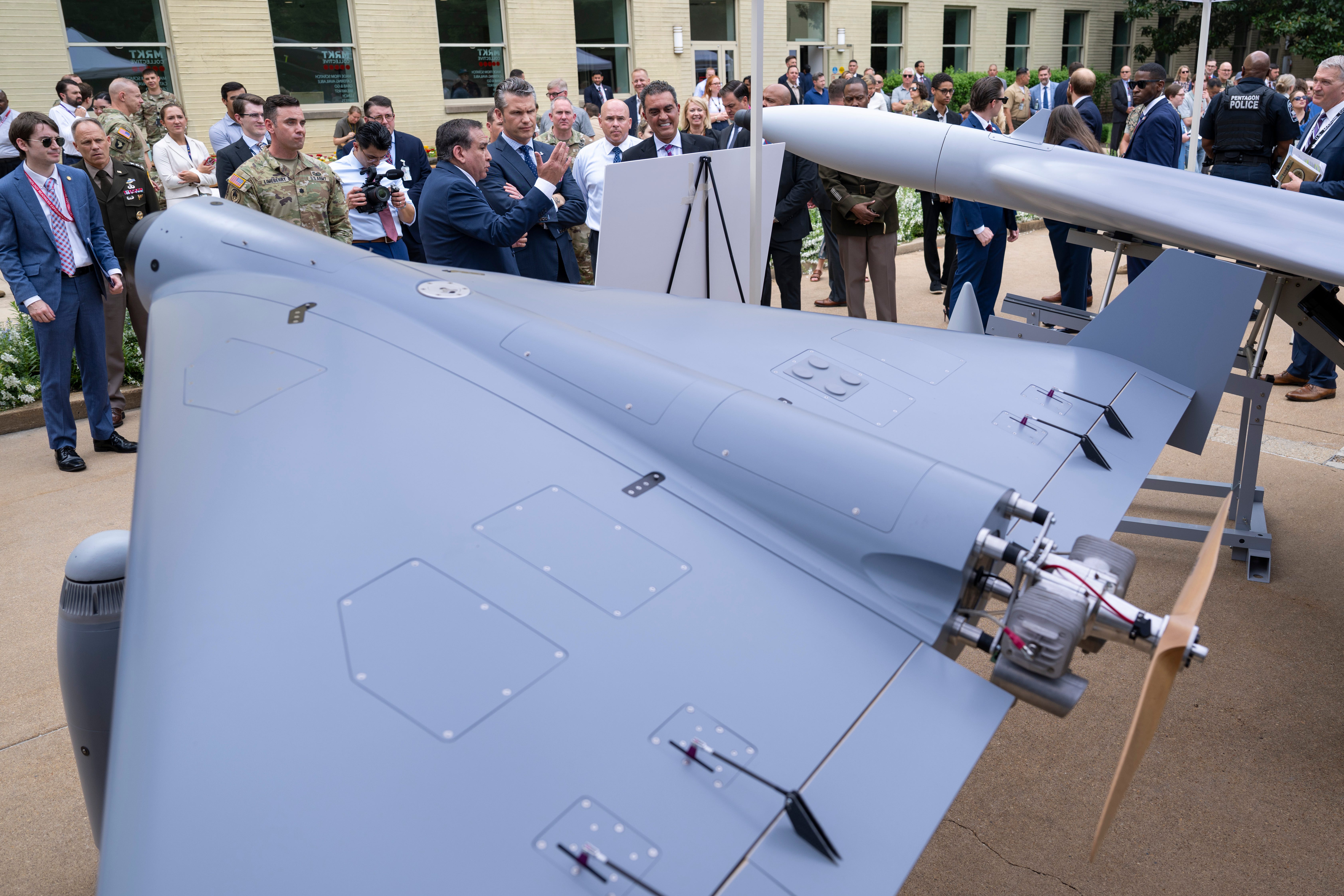 Secretary of Defense Pete Hegseth and Under Secretary of Defense for Research and Engineering Emil Michael tour multi-domain autonomous displays in the courtyard of the Pentagon, Washington, D.C., July 16, 2025.