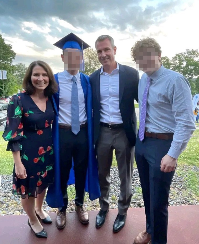 Megan Kerrigan Byron is seen  with teens presumed to be her two sons and her husband