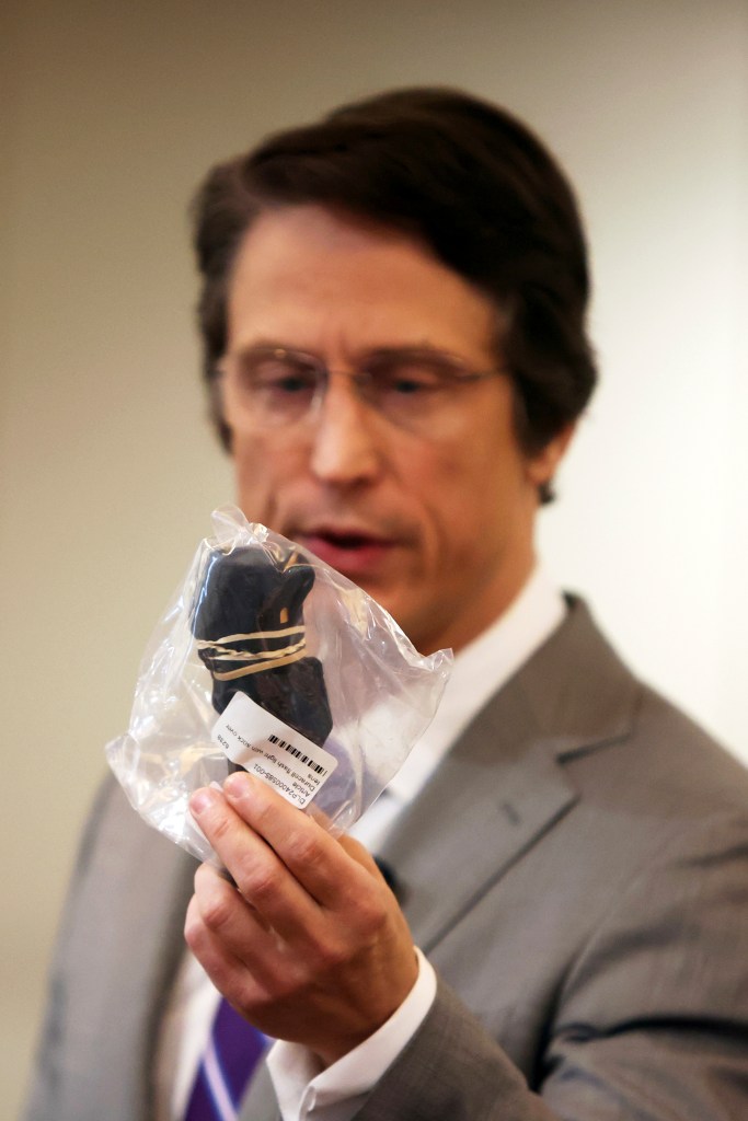 A flashlight with a sock attached, presented as evidence in a Minnesota state senator's burglary trial.