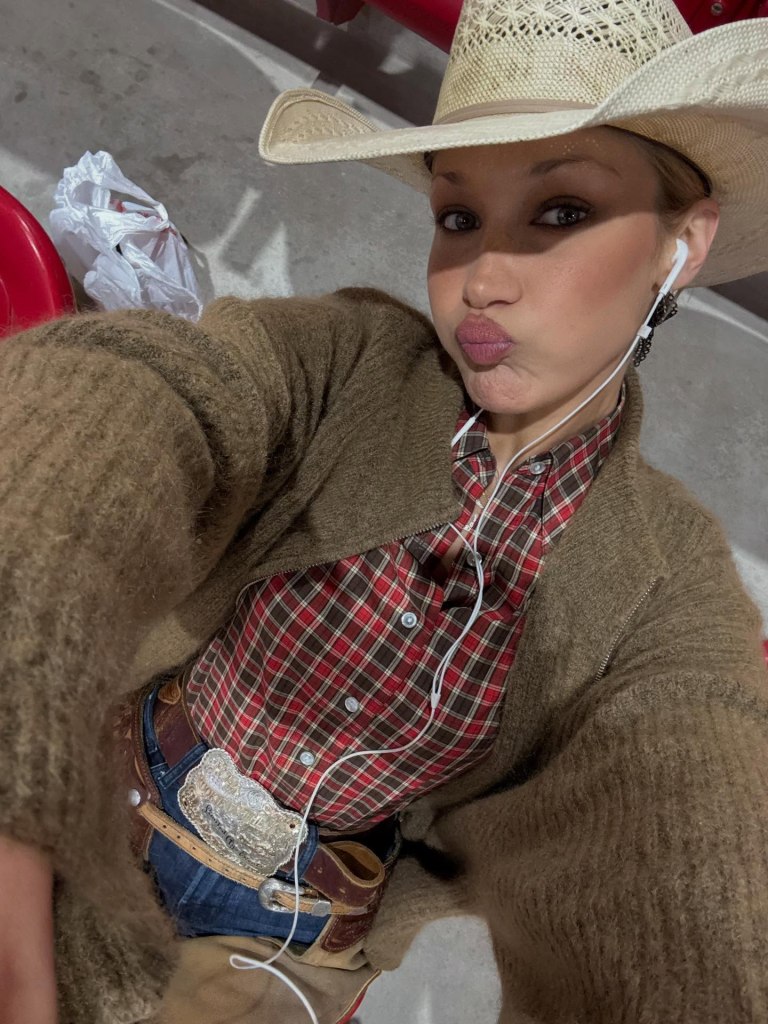 Bella Hadid is an official cowgirl, belt buckle and all. She posted on Insta that she’d won her first rodeo in Colorado.
