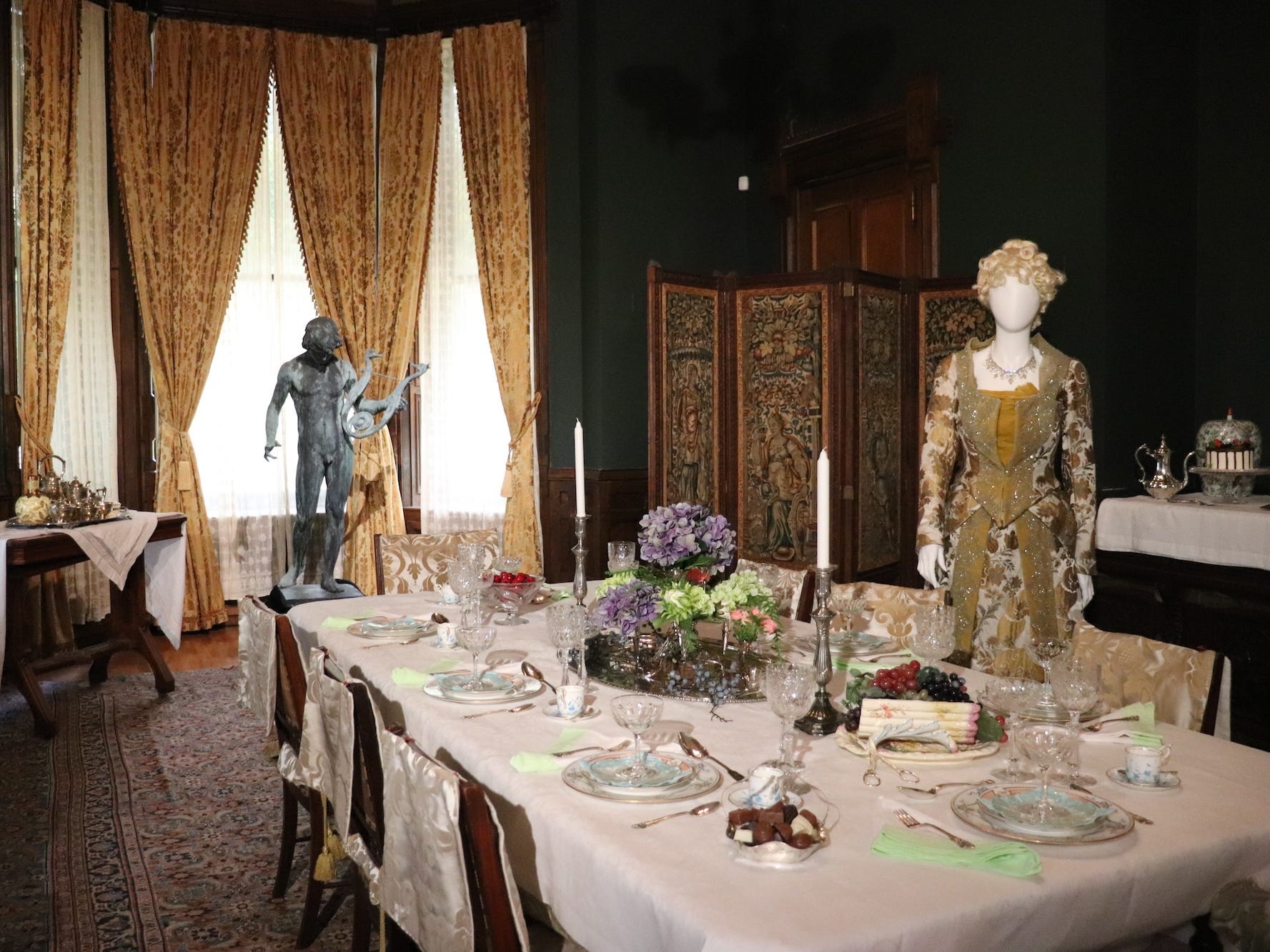 A costume from "The Gilded Age" in the Dining Room at Glenview.