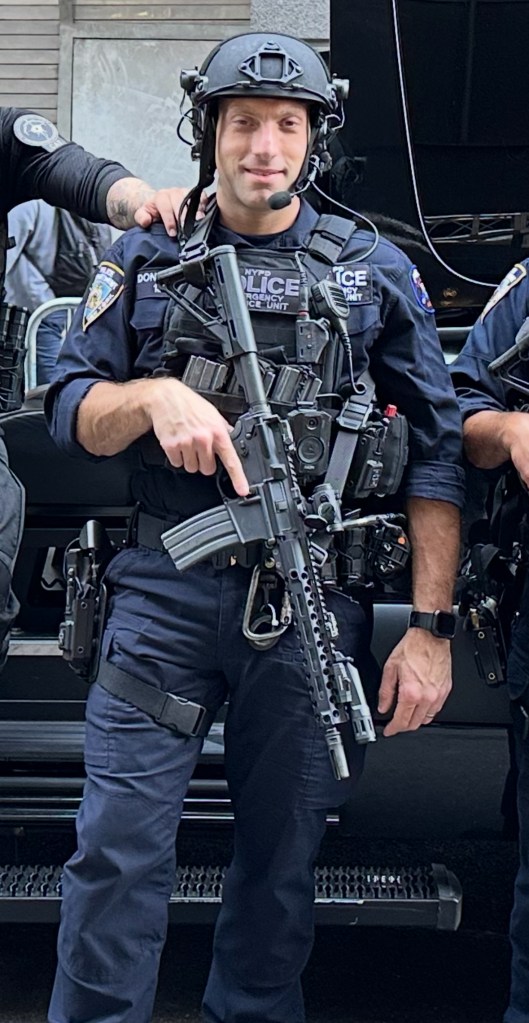 NYPD Emergency Service Unit officer holding a rifle.