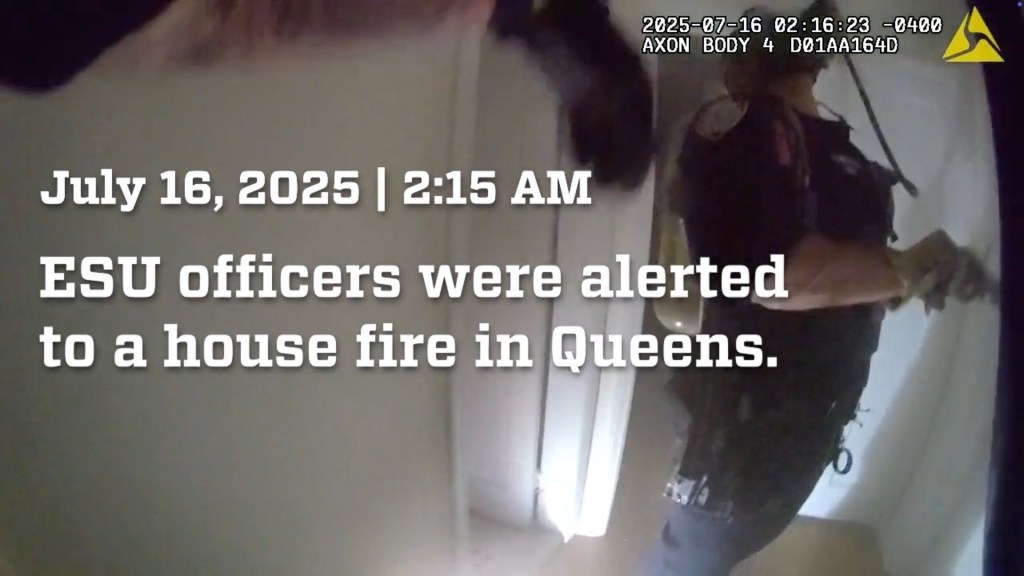 NYPD ESU officers responding to a Queens house fire.
